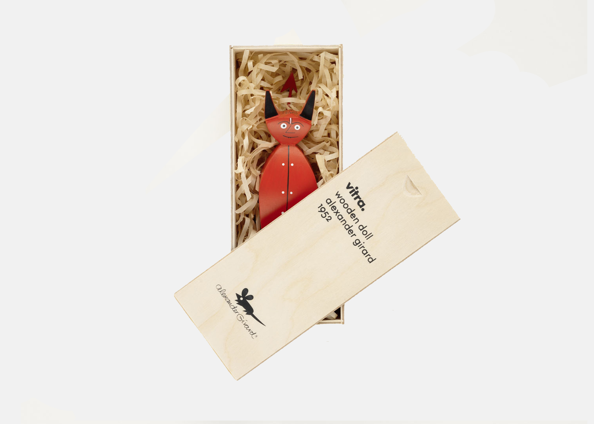 an image of a red devil figurine inside a casket
